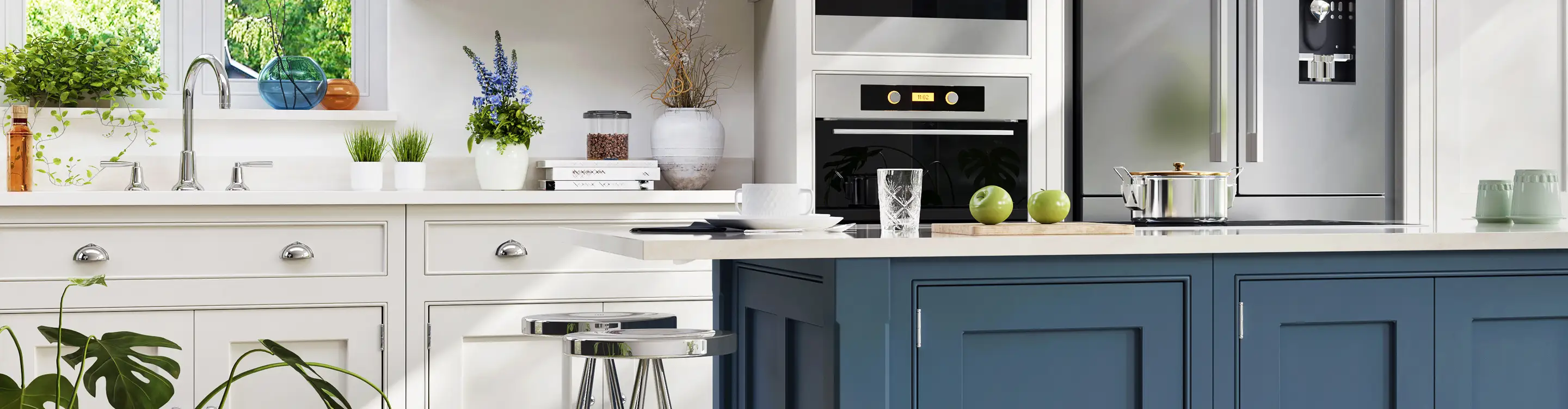 white cabinets in kitchen with plants